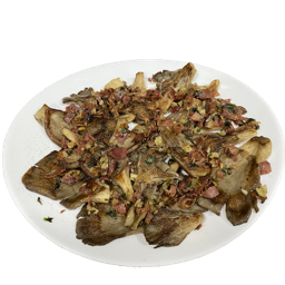 Setas a la plancha con virutas de jamón