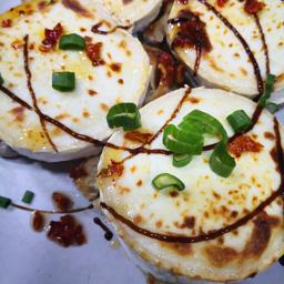 RULO DE CABRA GRATINADO