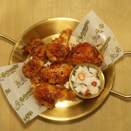 ALITAS O MUSLOS SIN HUESO CON SALSA PICANTE COREANA