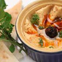 Hummus con mozzarella y pesto de tomate seco