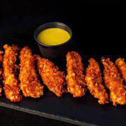 Finguers de pollo con salsa de miel y mostaza