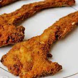 Costillitas de cabrito a la milanesa