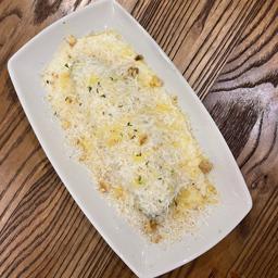 Canelón de pularda trufada con setas